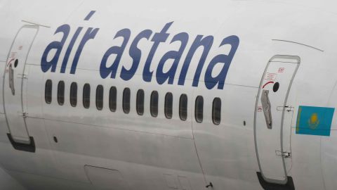A plane belonging to Air Astana, the flag carrier of the Republic of Kazakhstan, is seen parked in Hong Kong International Airport in June 2019.