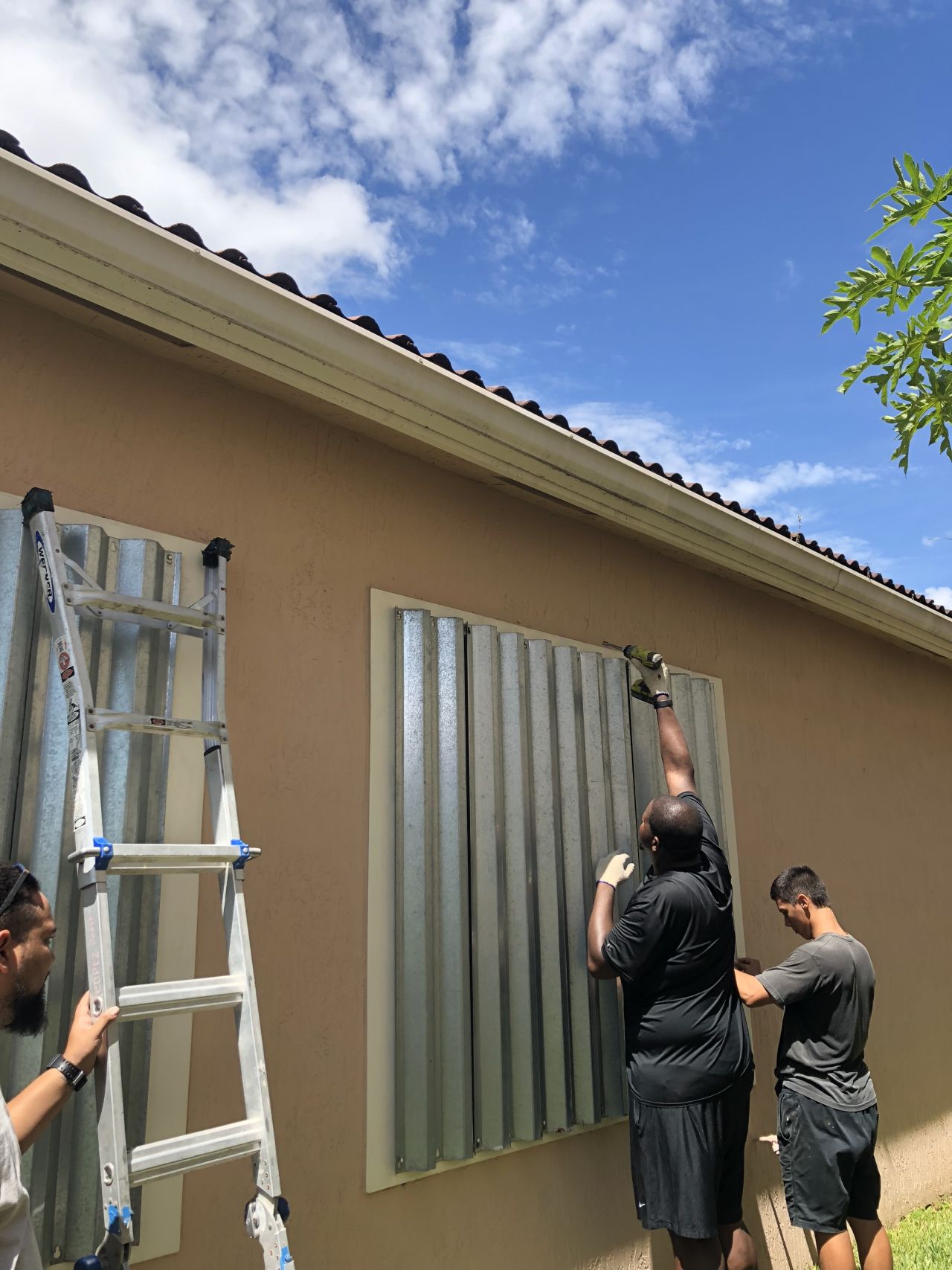 Jonah Bryson shared this photo of volunteers boarding up a home in Coral Springs, Florida, in preparation for Hurricane Dorian.