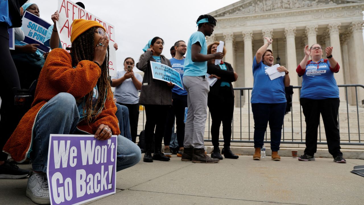 Demonstrators show support for affirmative action outside the Supreme Court on Monday.