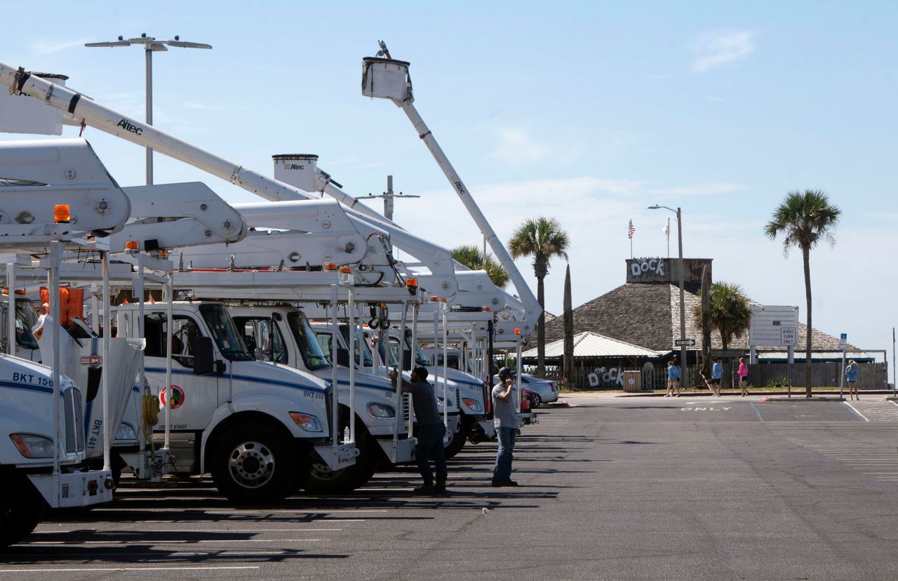 North Houston Pole Line utility crews stage at Casino Beach on Santa Rosa Island in Northwest Florida on Wednesday.