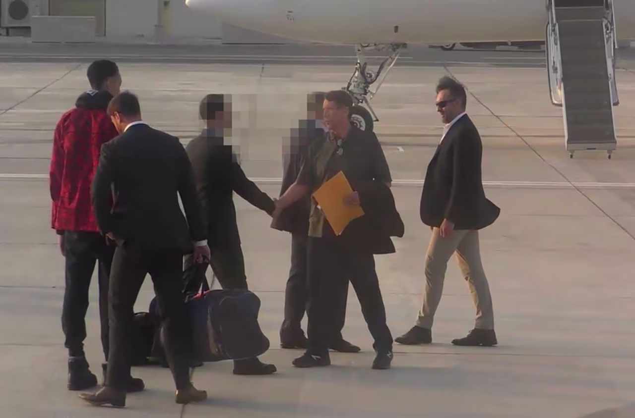 This video grab shows Brittney Griner and Viktor Bout during the exchange. 