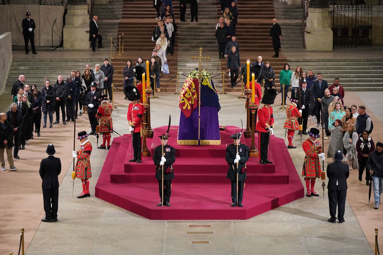 Members of the public pay their respects at the coffin of?Queen?Elizabeth?II at the Palace of Westminster in London on Monday.