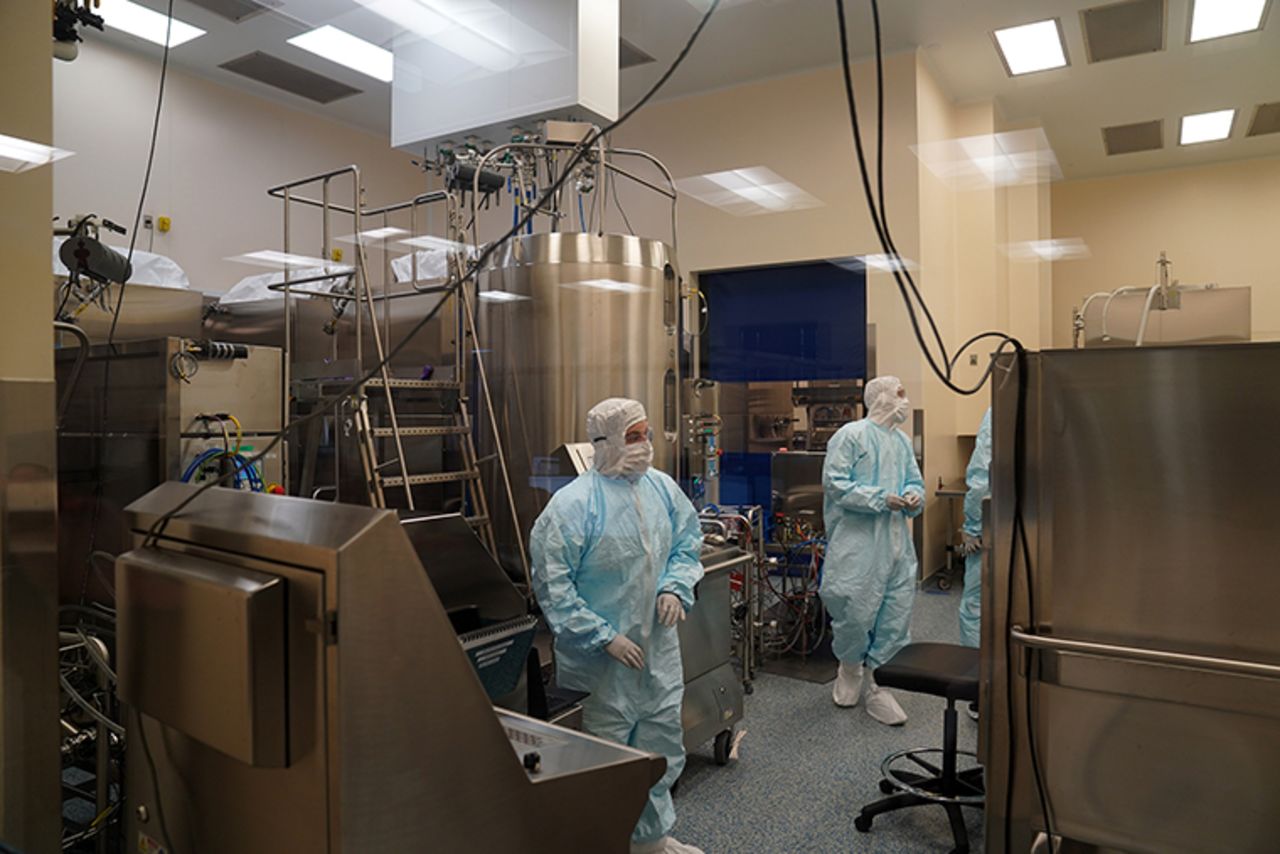 Employees work in a lab at Emergent Biosolutions, which is manufacturing vaccines for AstraZeneca and Johnson & Johnson on February 8,  in Baltimore, Maryland. 