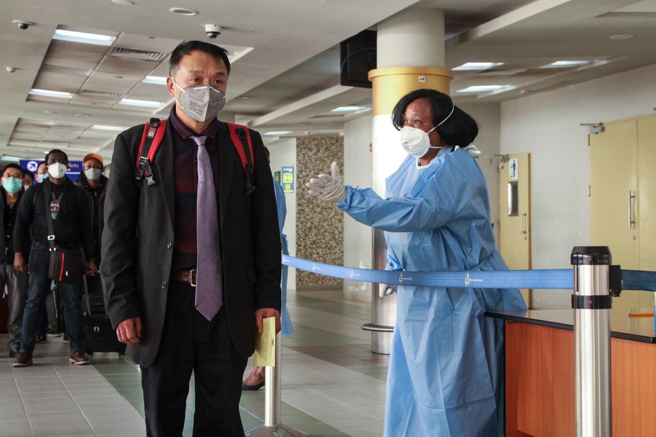 Passengers arriving from China are screened for coronavirus upon their arrival at the Jomo Kenyatta international airport in Nairobi, Kenya on Wednesday, January 29.