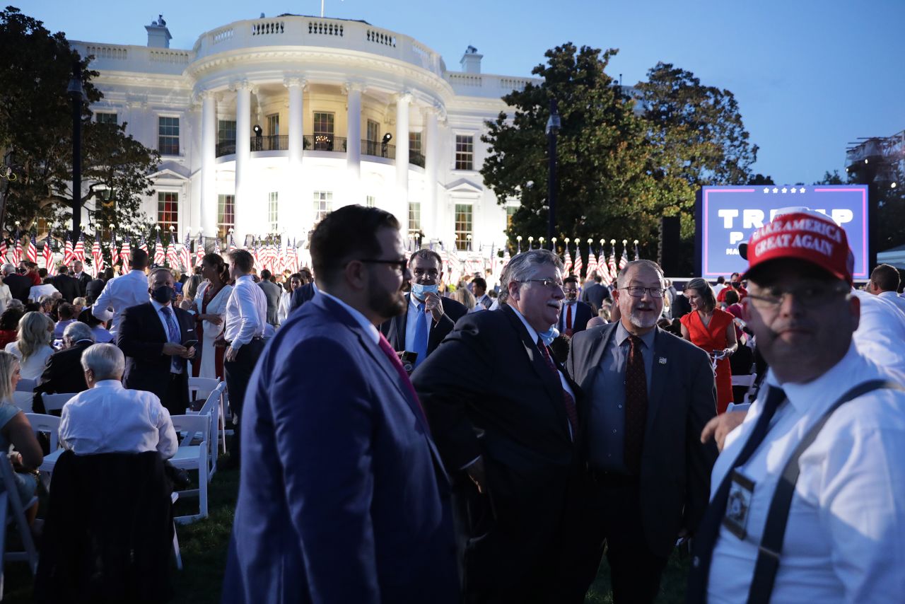 Guests gather to watch U.S. President Donald Trump deliver his acceptance speech for the Republican presidential nomination on the South Lawn of the White House on August 27 in Washington.