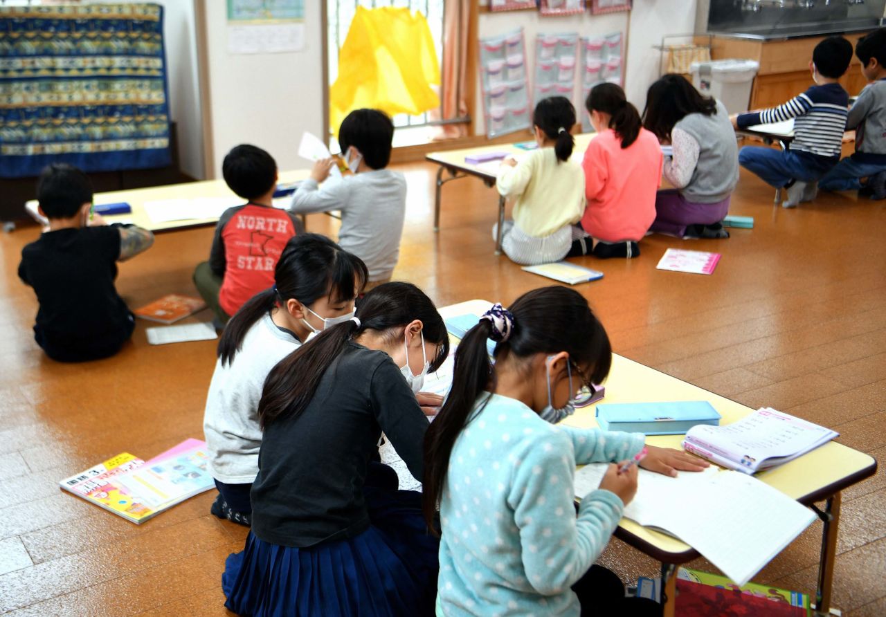 Children study at a community center after schools closed in Tokyo, Japan on March 2. Prime Minister Shinzo Abe asked that Japanese schools remain closed until later this month, as an emergency measure to contain the spread of the coronavirus.