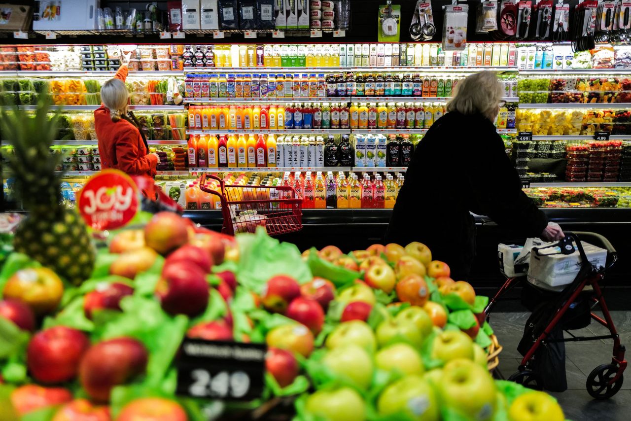 People shop in a supermarket in New York on January 27. 