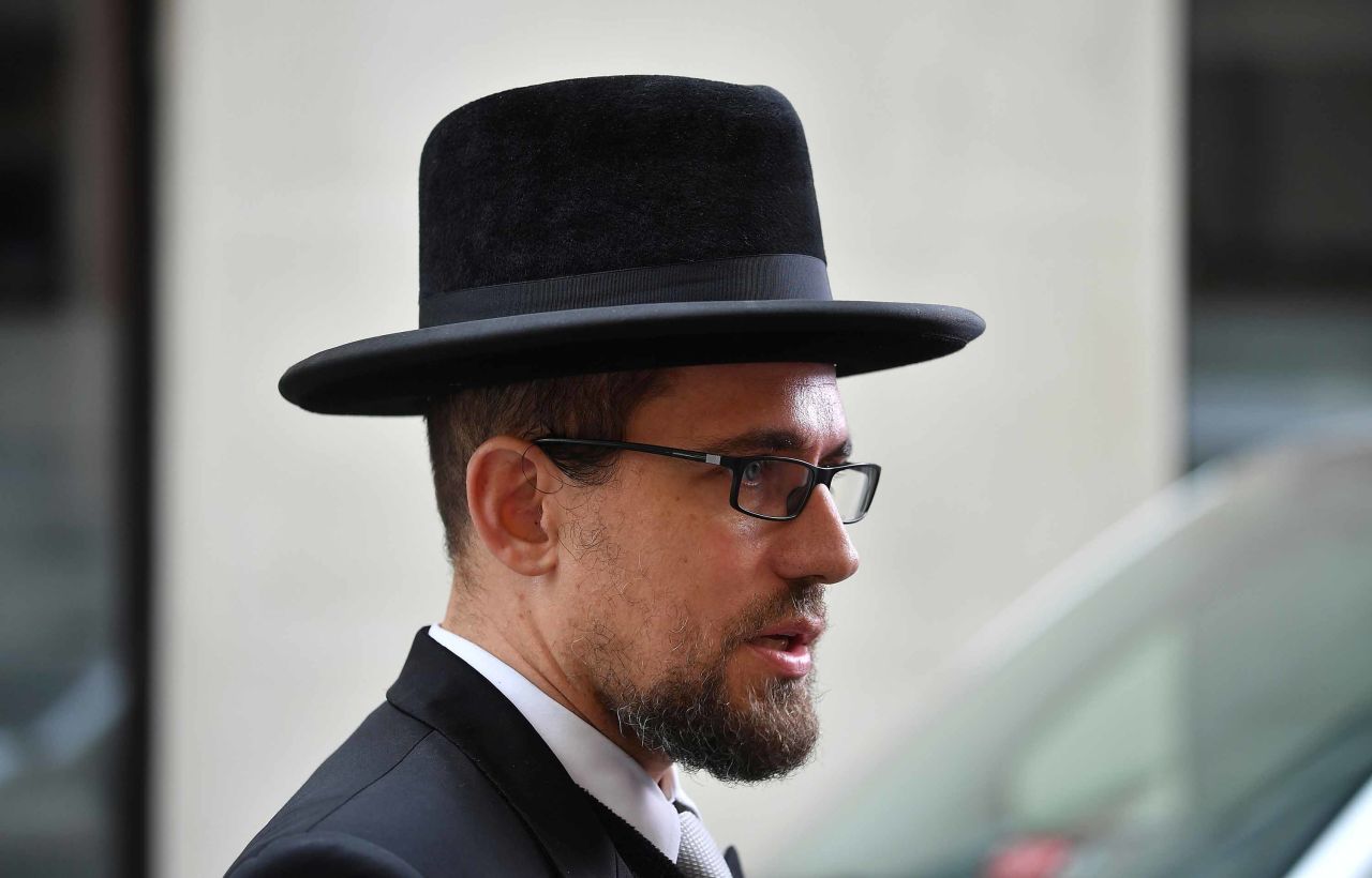 Rabbi Schlomo Hofmeister speaks to the media near the scene of the attack in Vienna, on Tuesday, November 3.