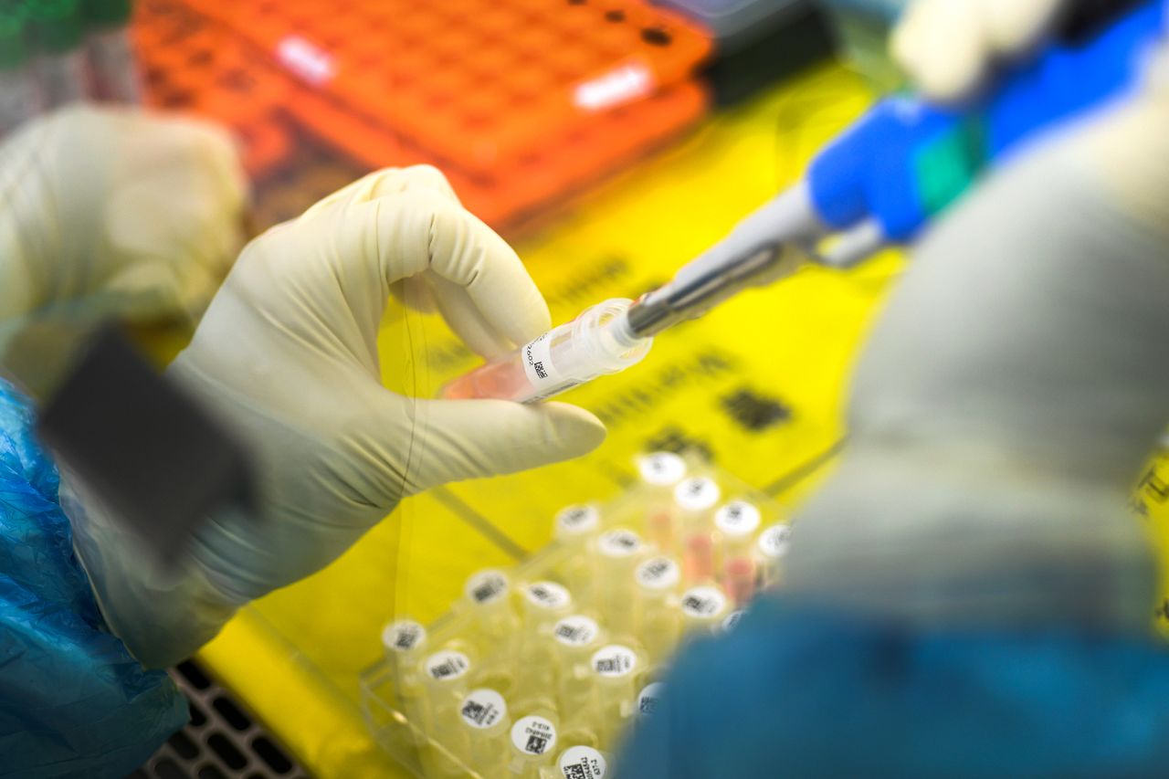 An employee works in the pop-up Huoyan Laboratory in Wuhan in central China's Hubei province on Thursday, February 6.