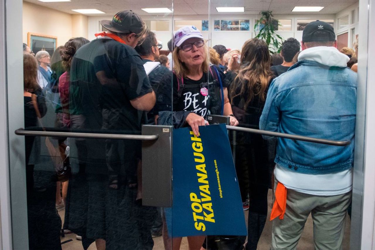 Demonstrators protest US Supreme Court nominee Brett Kavanaugh inside the office of US Senator Joe Manchin (D-WV) on October 5, 2018 in Washington, DC.