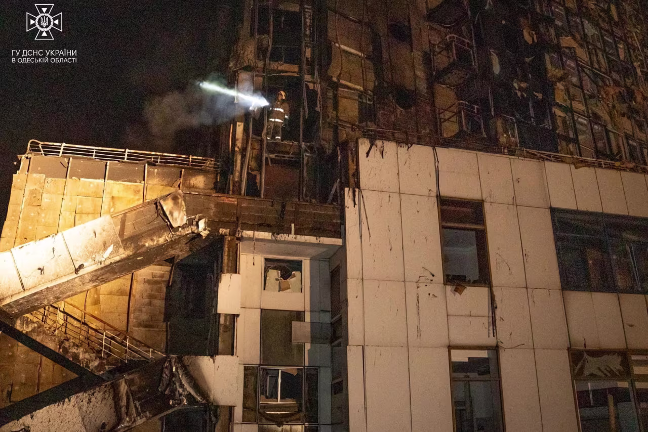 A firefighter works at a site of a hotel damaged by a Russian military attack in Odesa, Ukraine, on September 25.