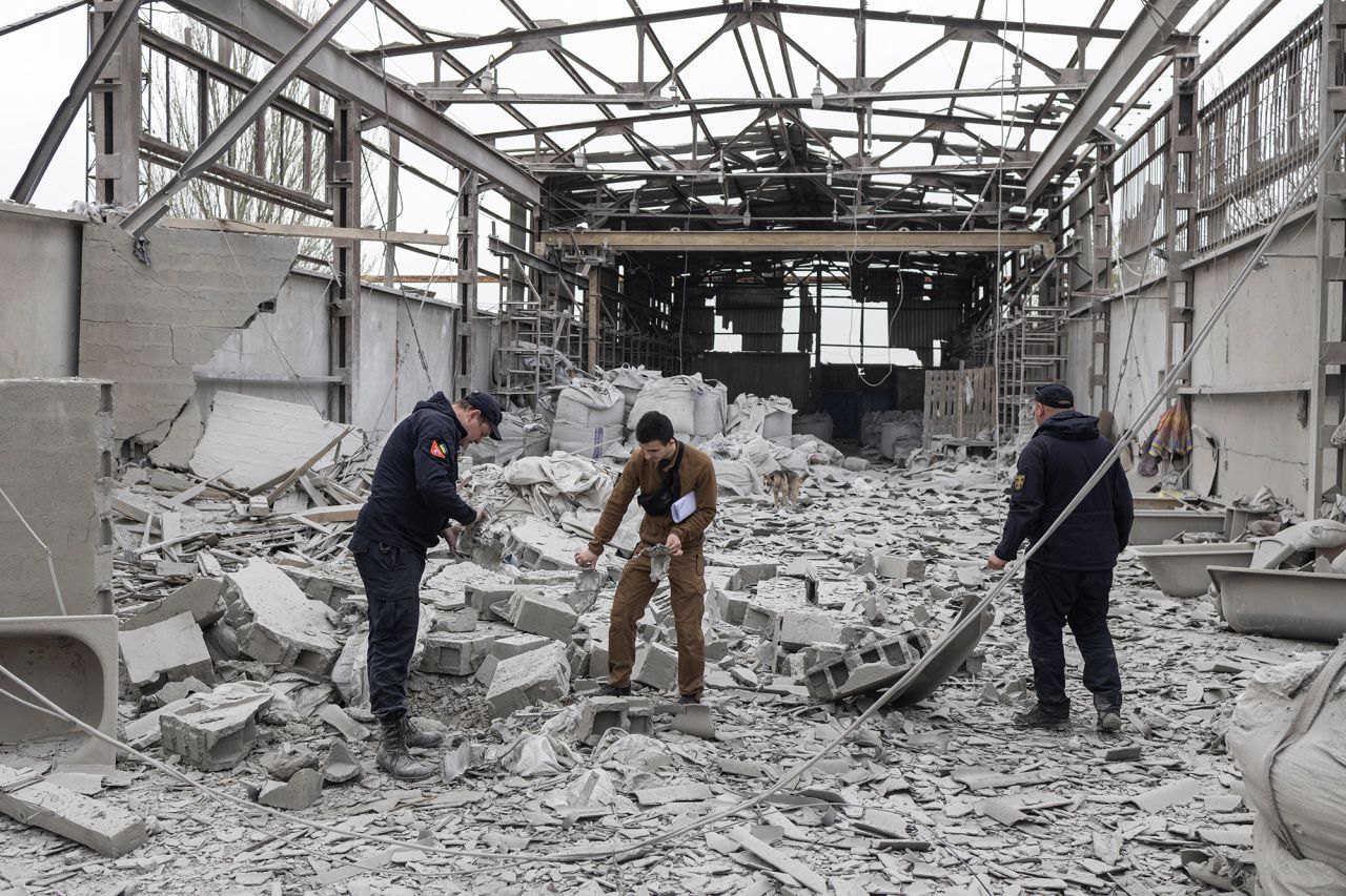 Ukrainian servicemen check the area of a missile strike in?Kramatorsk, Ukraine, on April 19.