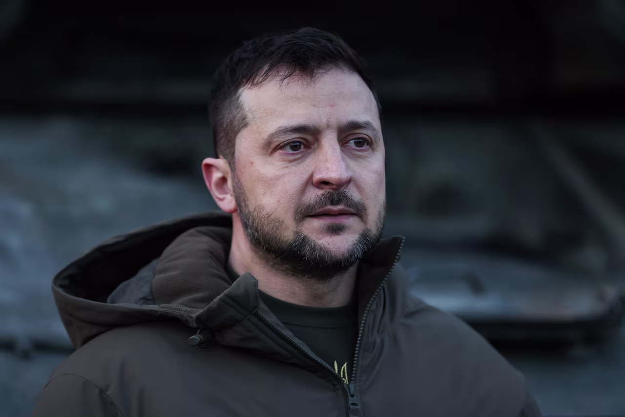 Ukrainian President Volodymyr Zelensky meets with Ukraine's armed forces being trained to use Challenger 2 tanks by members of the British Army in Lulworth Camp, England. 