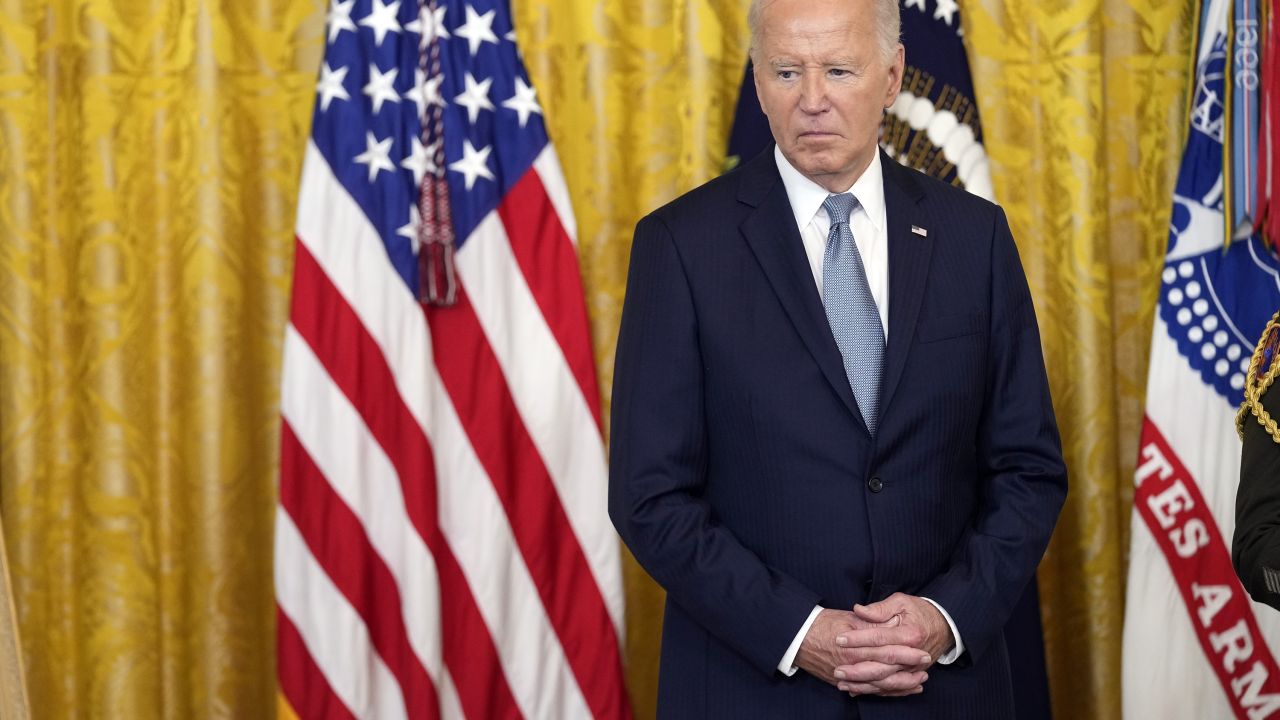 President Joe Biden listens as citations are read during a Medal of Honor ceremony at the White House in Washington, DC, on July 3.