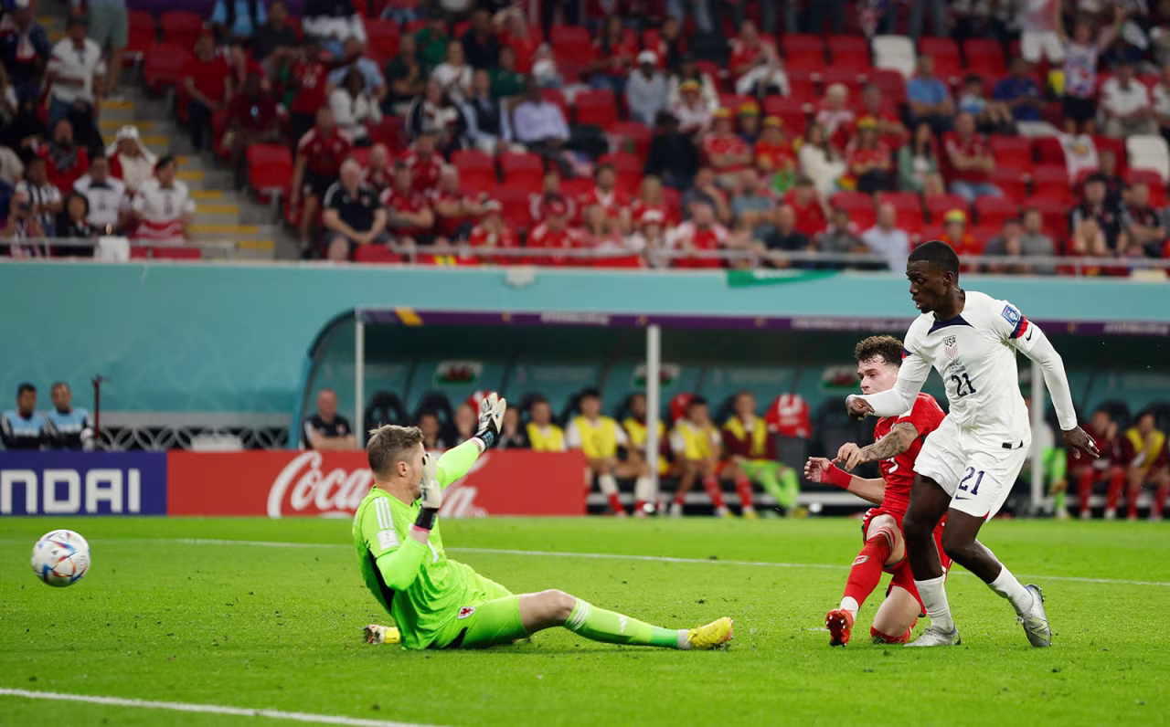 USA's Timothy Weah scores the first goal of the match against Wales on November 21.