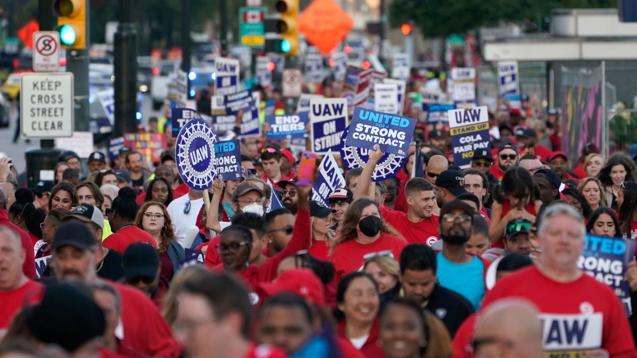 UAW members march through downtown Detroit on September 15.