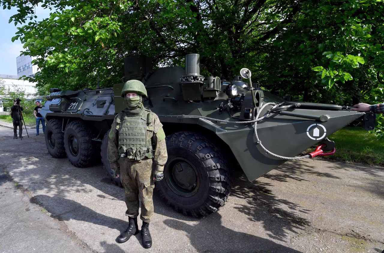A Russian serviceman stands guard at the Russian-controlled Zaporizhzhia nuclear power plant in southern Ukraine on June 15.