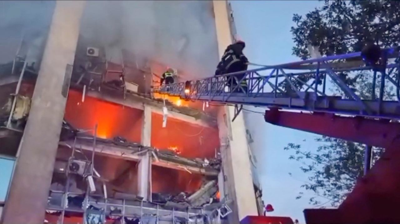 Firefighters work at a damaged property following a Russian drone attack in?Izmail, in Ukraine's Odesa region, on August 2.