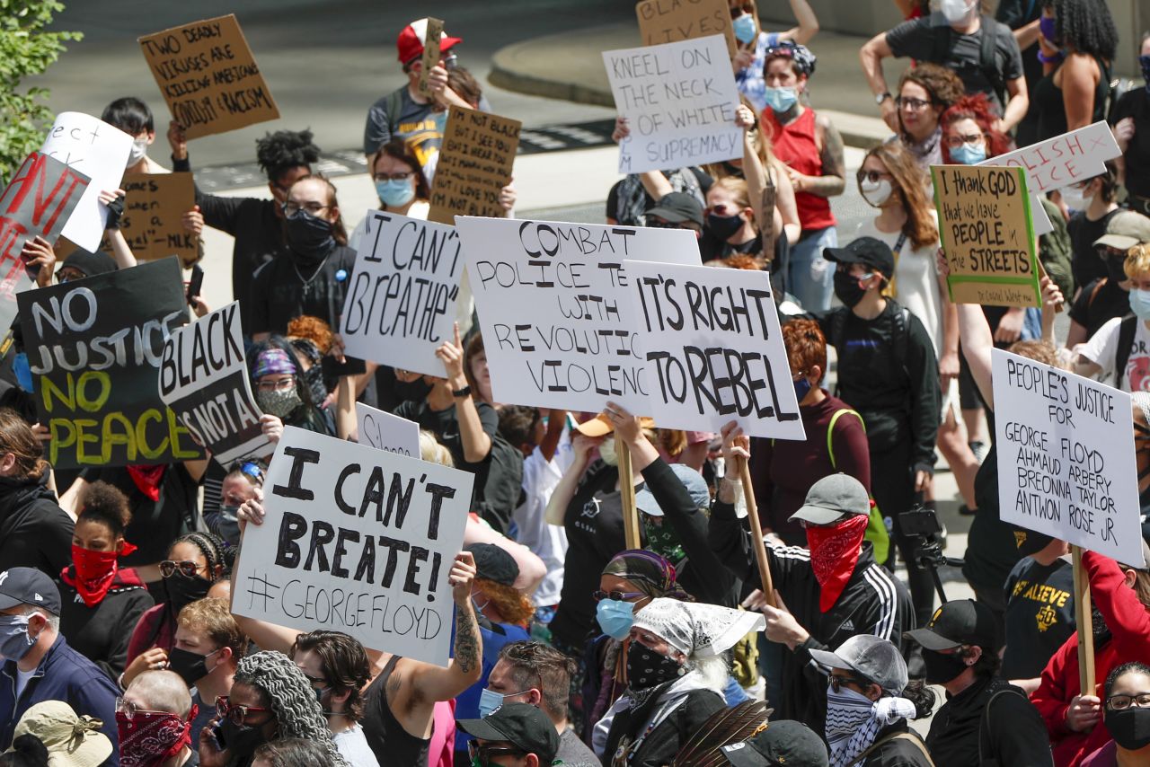 Demonstrators gather in a street during a march in Pittsburgh on May 30.