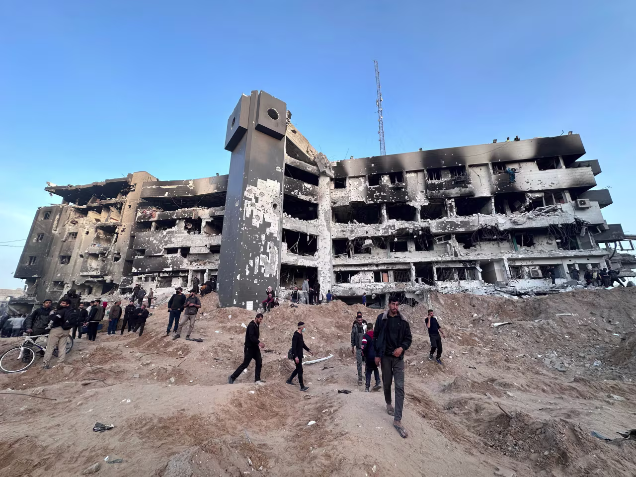 People inspect the damage at Al-Shifa hospital in Gaza on April 1.