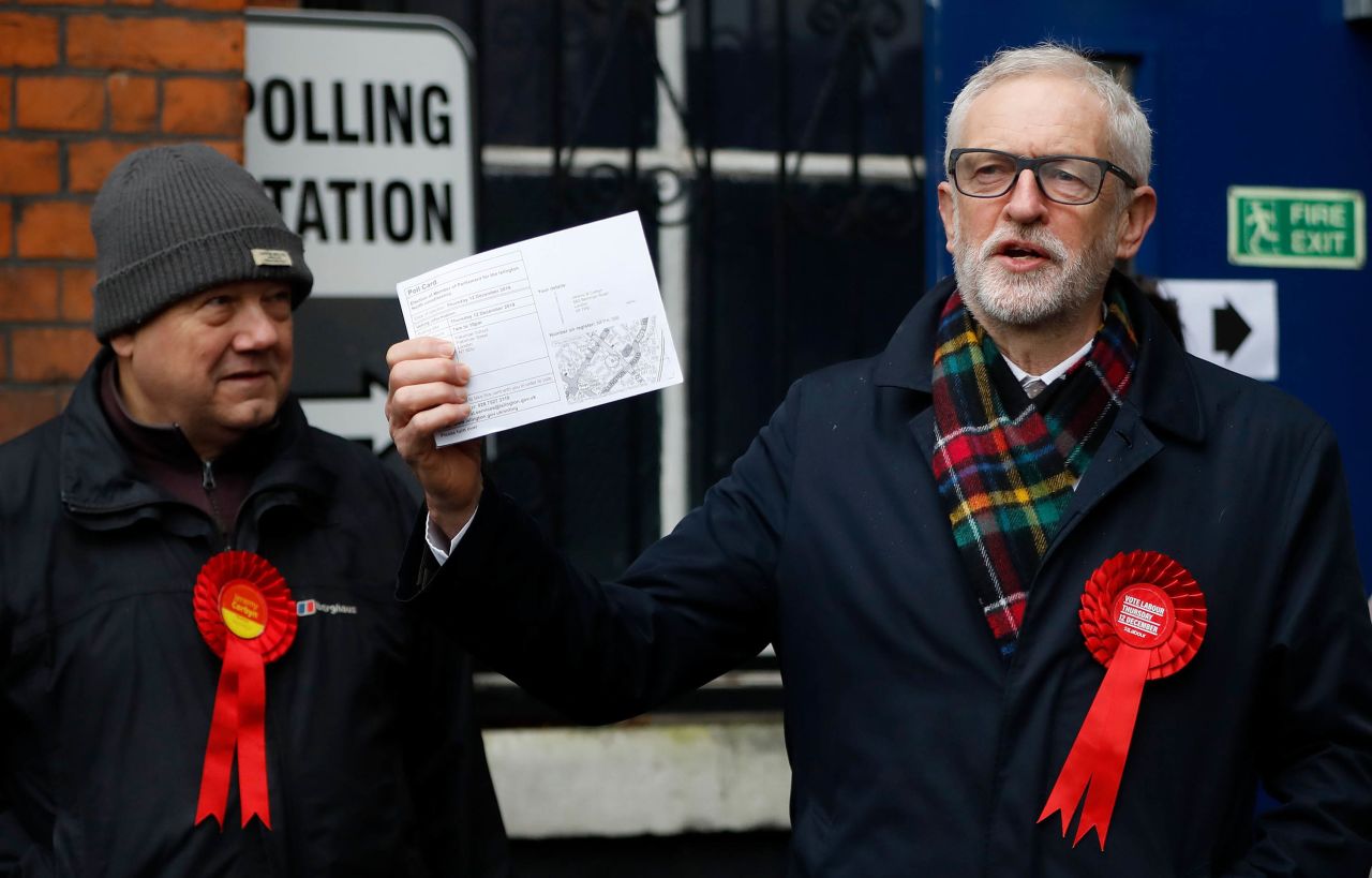 Britain's main opposition Labour Party leader Jeremy Corbyn holds his polling card as he arrives at a voting station north London. Photo: Tolga Akmen/AFP via Getty Images