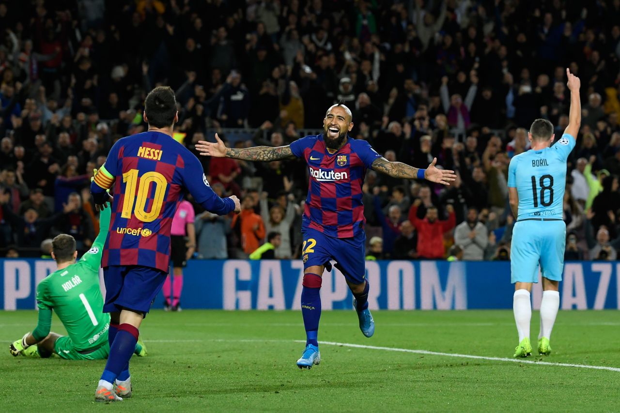 Arturo Vidal celebrates with Lionel Messi ... but the offside flag is raised.