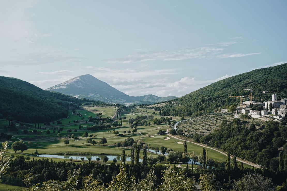 The castle offers a sweeping view of the golf course below and valleys beyond.