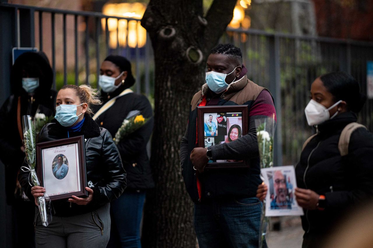 Healthcare workers mourn colleagues who have died during the coronavirus outbreak at a demonstration near Mount Sinai Hospital in New York City on April 10.