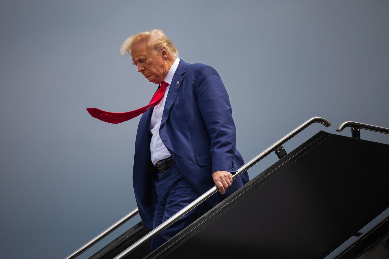 Former President Donald Trump arrives at Ronald Reagan Washington National Airport in Arlington, Virginia, on August 3.