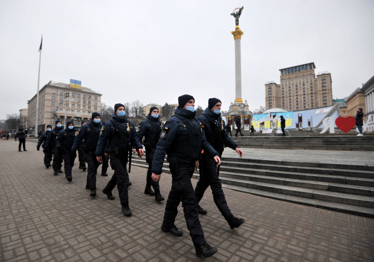 Ukrainian police officers march in Independence Square in central Kyiv on February 16. 