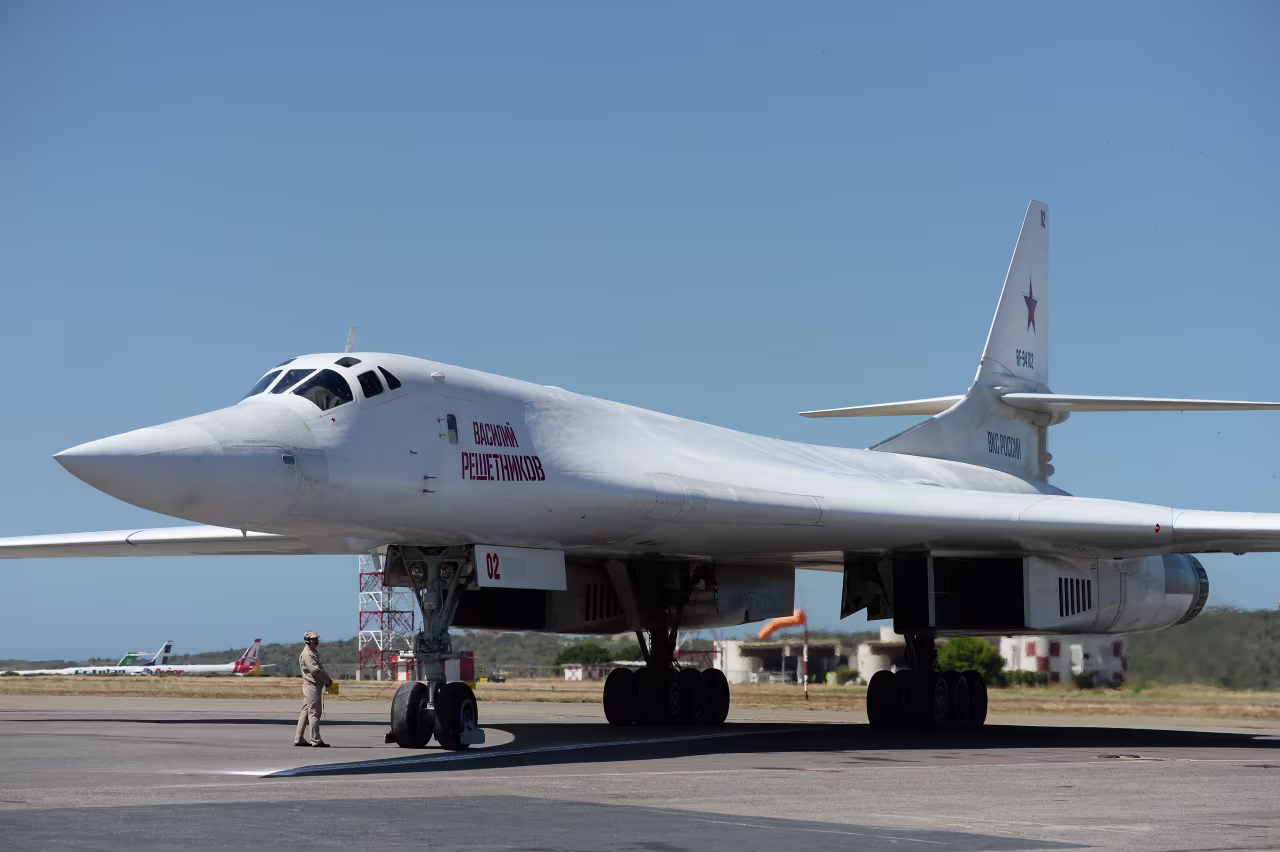 A Russian Tupolev Tu-160 strategic long-range heavy supersonic bomber aircraft is pictured upon landing at Maiquetia International Airport, Venezuela, on December 10, 2018.