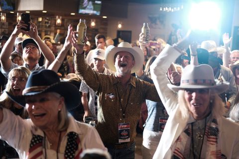 People celebrate during the election night party for Harriet Hageman in Cheyenne, Wyoming, Tuesday evening.