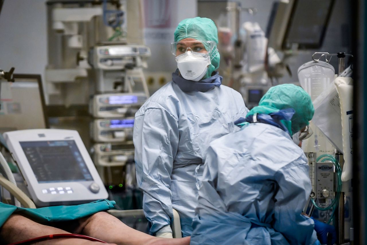 Doctors tend to Covid-19 patients in the intensive care unit of San Matteo Hospital, in Pavia, Italy, on March 26.