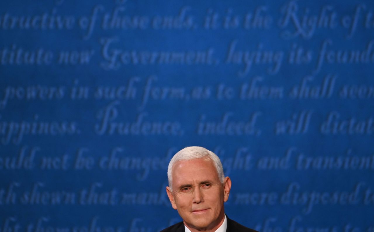 US Vice President Mike Pence looks on during the vice presidential debate in Kingsbury Hall at the University of Utah on October 7, in Salt Lake City.