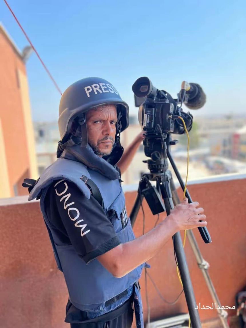 A photo taken about a month ago shows Hussam Al-Massri, a Reuters journalist killed by Israel in Gaza, working from the same staircase of Nasser Hospital where he was killed on Monday.