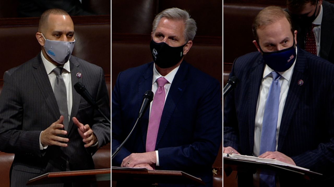 From left to right, Rep. Hakeem Jeffries, House Minority Leader Kevin McCarthy, and Rep. Jason Smith speak on the House floor in Washington, DC, on March 10.