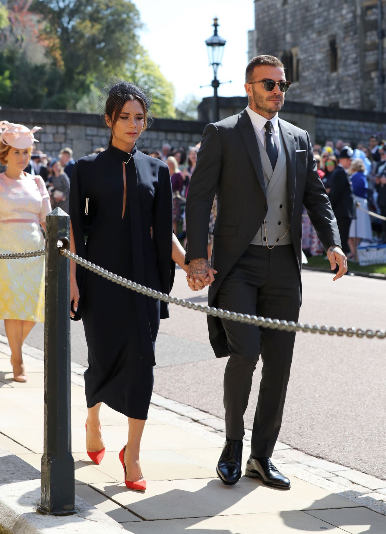 David Beckham and Victoria Beckham arrive at St George's Chapel on Saturday. 