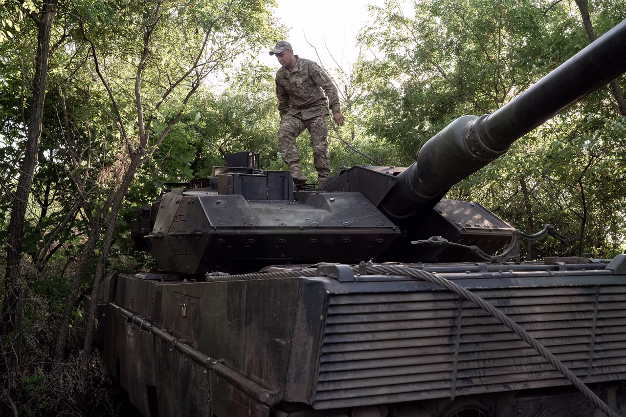 An Ukrainian army soldier stands on a Leopard 2 tank in Zaporizhia's Oblast, Ukraine on September 16.