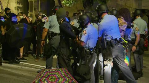 Atlanta police arrest protesters on Wednesday night. 