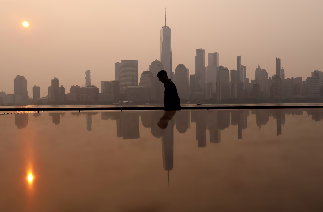 Smoke continues to shroud the sun on Wednesday, in Jersey City, New Jersey.