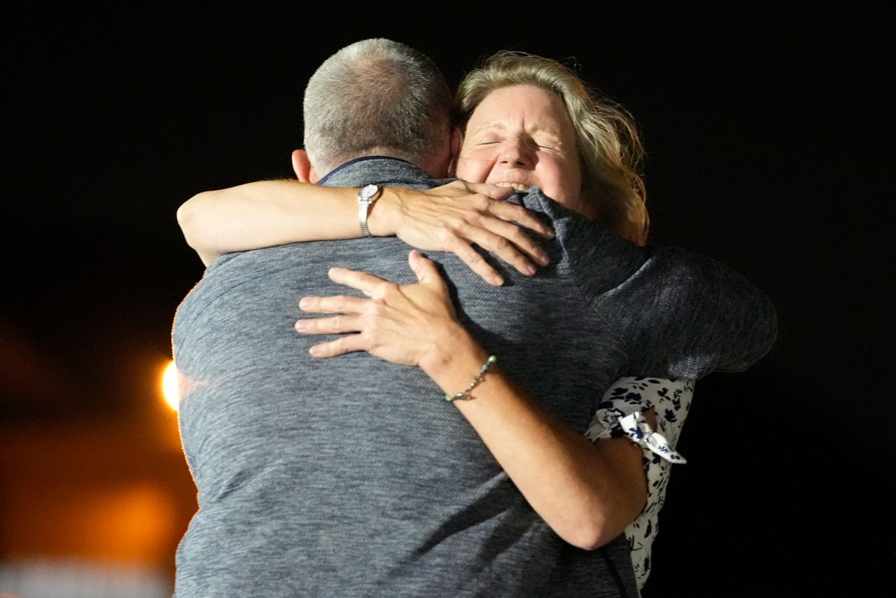 Elizabeth Whelan, right, hugs her brother Paul Whelan after he landed in the US on Thursday.