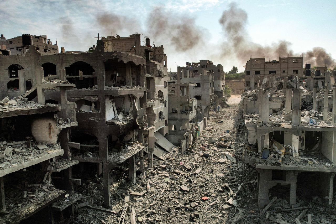 An aerial view of buildings destroyed by Israeli air strikes in the Jabalia camp for Palestinian refugees in Gaza City on October 11, 2023.