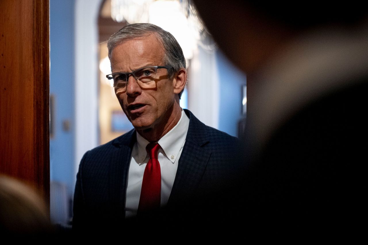 Sen. John Thune speaks to reporters outside his office after the House approved a 45-day funding bill to keep federal agencies open on Saturday in Washington, DC.