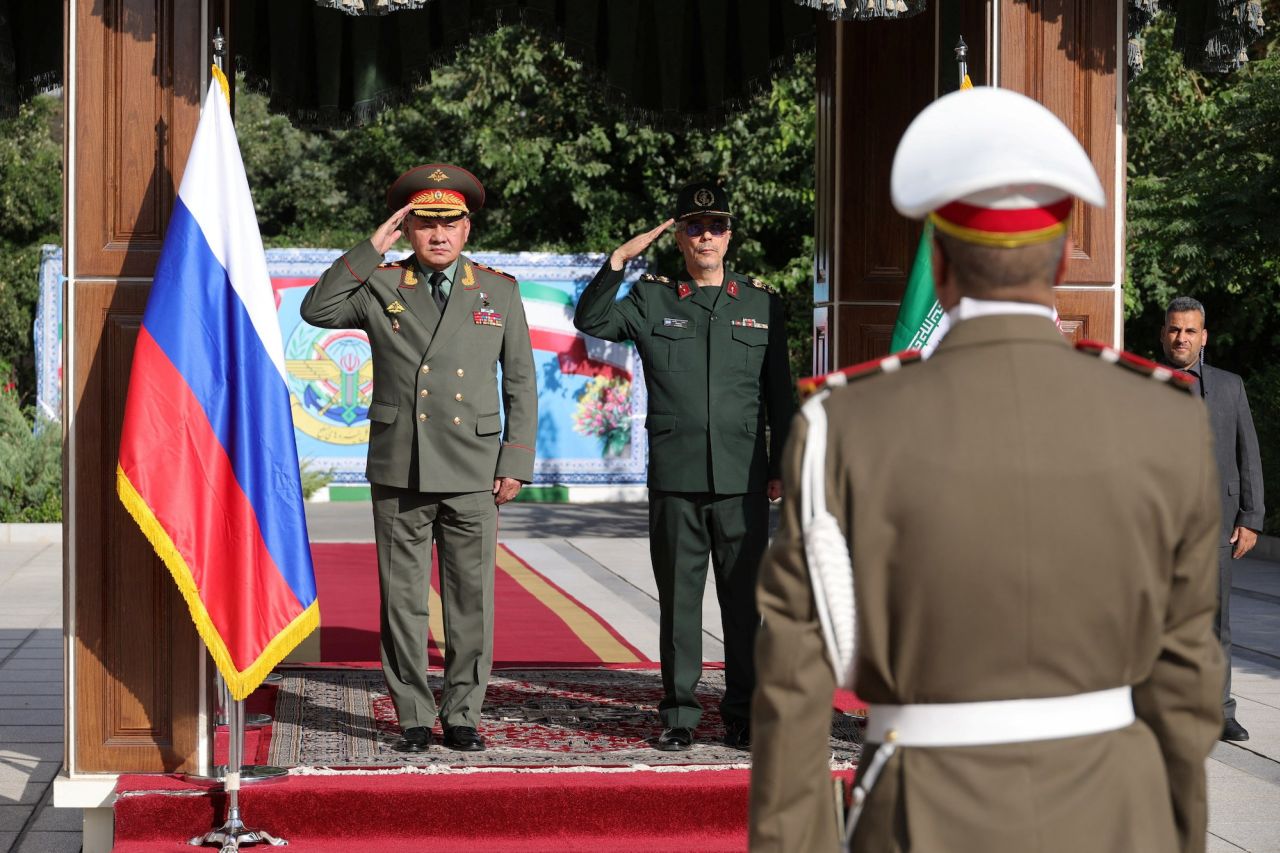 Russian Defense Minister Sergei Shoigu and Iranian Armed Forces chief of staff, Maj. Gen. Mohammad Bagheri, take part in an official welcoming ceremony in Tehran on Tuesday.