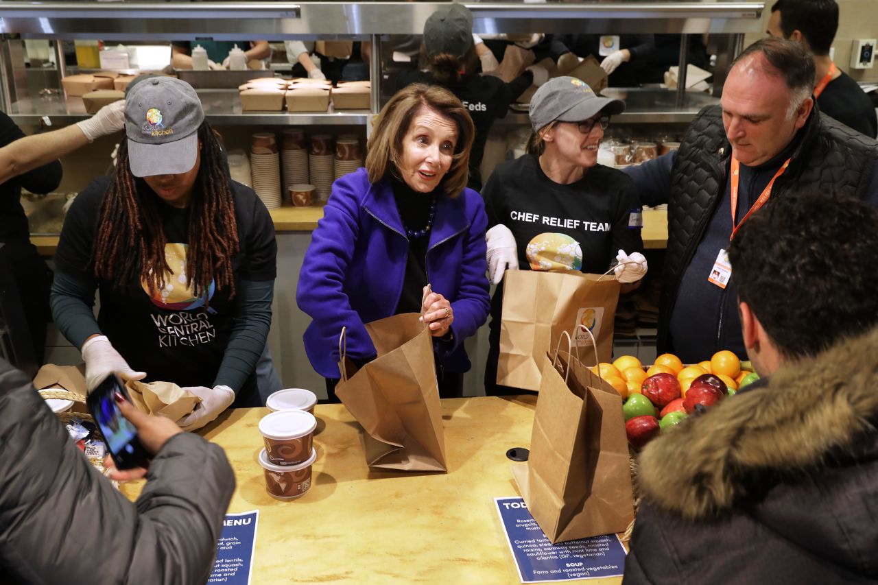 Speaker of the House Nancy Pelosi and chef Jose Andres help distribute food to furloughed federal workers at the World Central Kitchen on Jan. 22. 