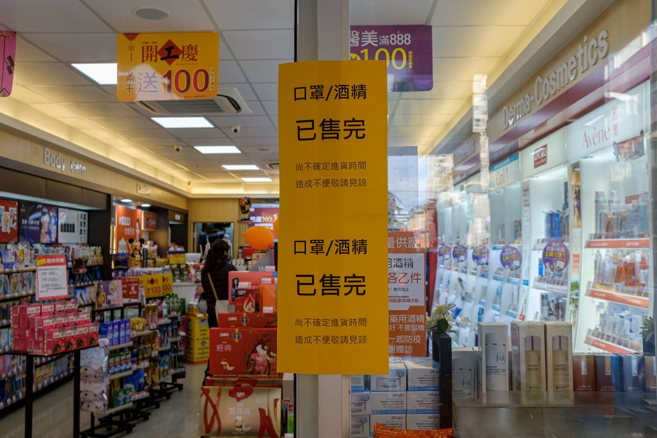 A drugstore in downtown Taipei displays a poster indicating that surgical masks, face masks and alcohol are sold out.?