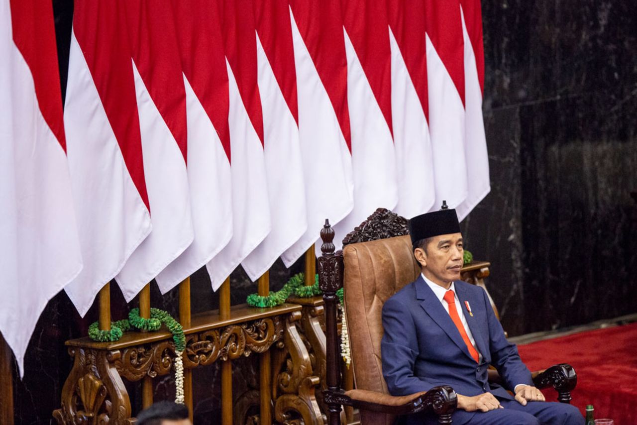 In this October 20, 2019 file photo, President Joko Widodo gestures during his inauguration ceremony at the House of Representative building in Jakarta, Indonesia. 