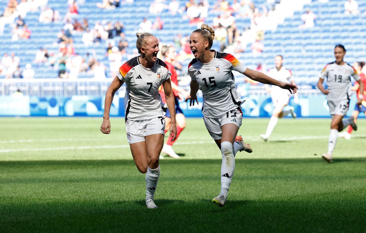 Giulia Gwinn of Germany, right, celebrates with teammate Lea Schüller after scoring a goal against Spain on Friday.