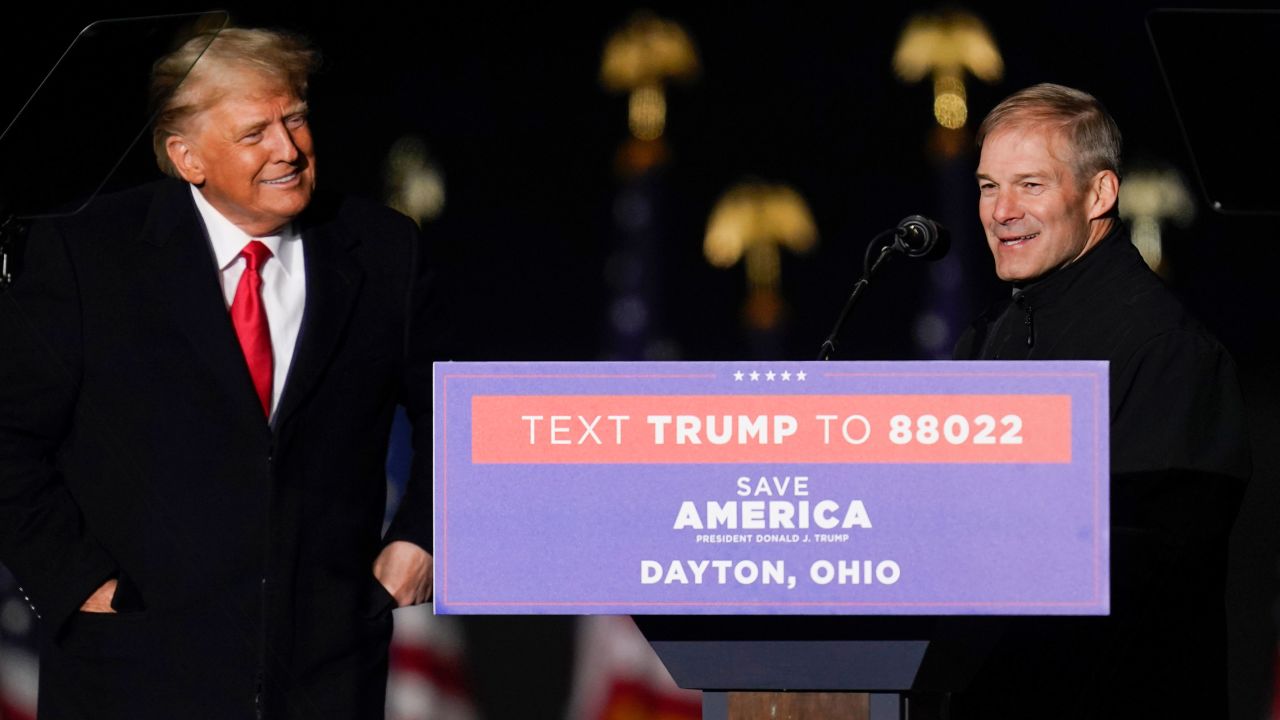 In this November 2022 photo, former President Donald Trump welcomes Rep. Jim Jordan to the stage at a campaign rally at Dayton International Airport in Vandalia, Ohio. 