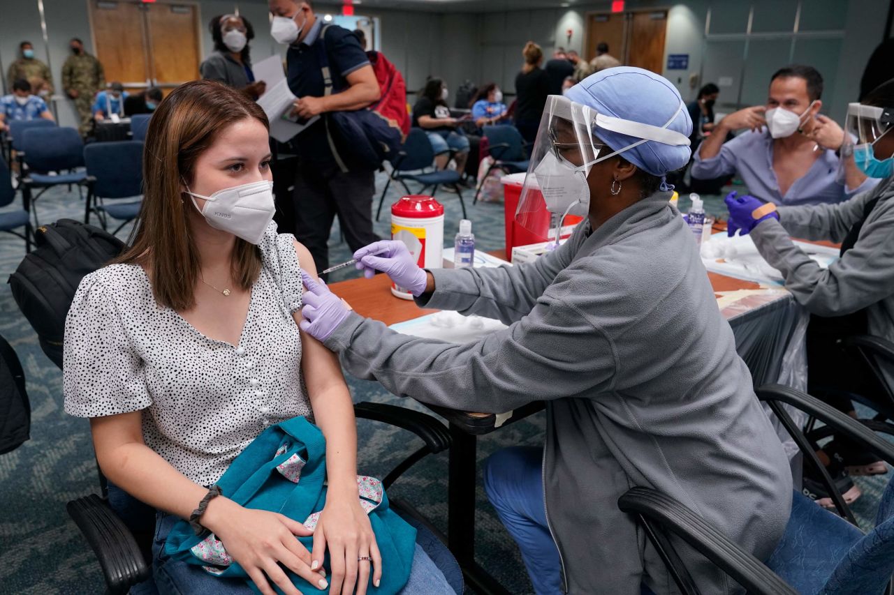 Natalia Dubom, of Honduras, gets the Johnson & Johnson COVID-19 vaccine at Miami International Airport on May 28 in Miami. 